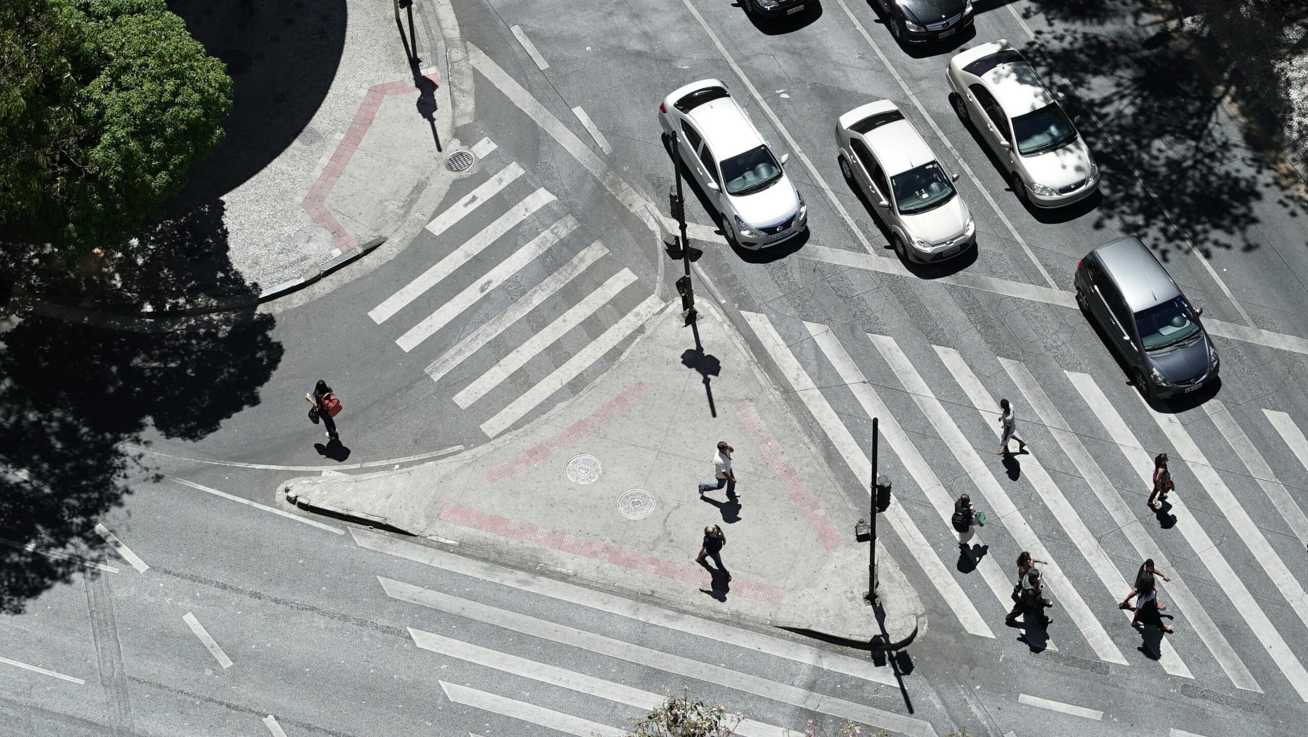 Pedestrians crossing road intersection